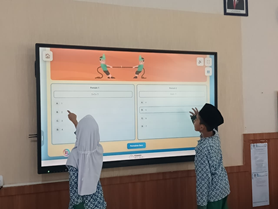 Penggunaan TV Flat Panel IFP dalam Pembelajaran Modern di Sekolah Islam Al – Madinah